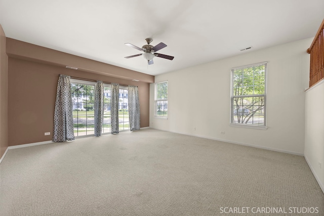 2319 Georgetown Ct, Aurora, IL 60503 - unfurnished room featuring a ceiling fan and carpet