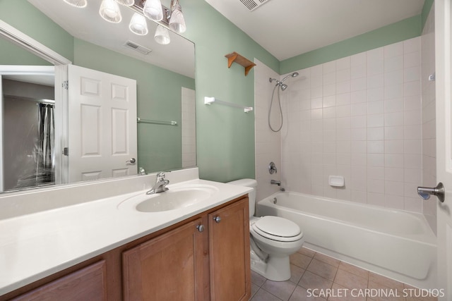 2319 Georgetown Ct, Aurora, IL 60503 - bathroom with tile patterned floors, vanity, and shower / bath combination