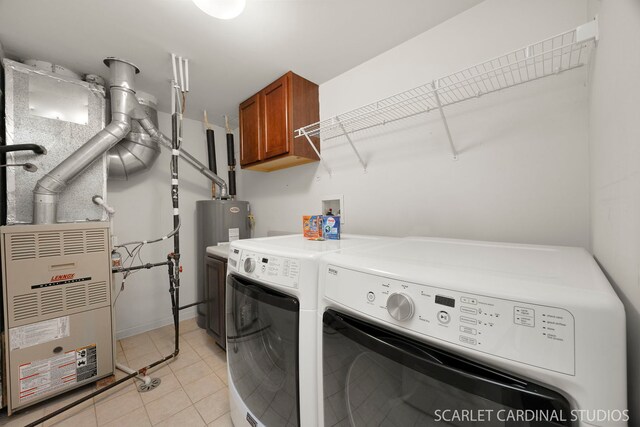 2319 Georgetown Ct, Aurora, IL 60503 - washroom with cabinet space, washer and clothes dryer, light tile patterned flooring, and water heater