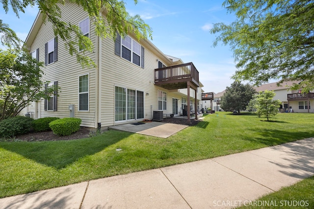 2319 Georgetown Ct, Aurora, IL 60503 - back of house featuring a yard, a patio, and a deck