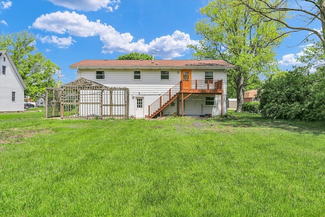 313 W Church St, Savoy, IL 61874 - back of house with a wooden deck, a yard, and stairway