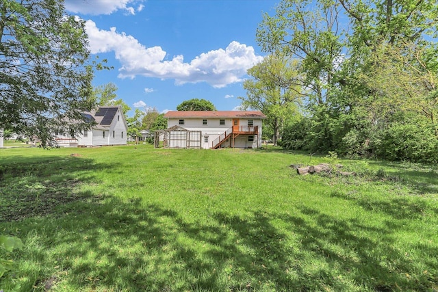 313 W Church St, Savoy, IL 61874 - view of yard with a wooden deck and stairs