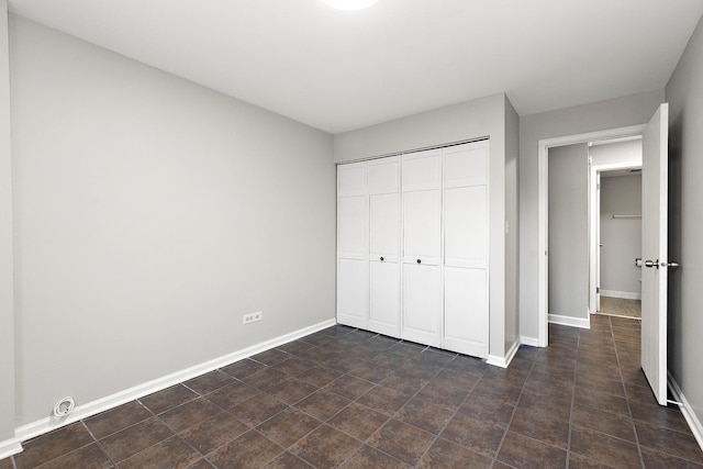 254 E Bailey Rd Unit M, Naperville, IL 60565 - unfurnished bedroom with a closet and baseboards