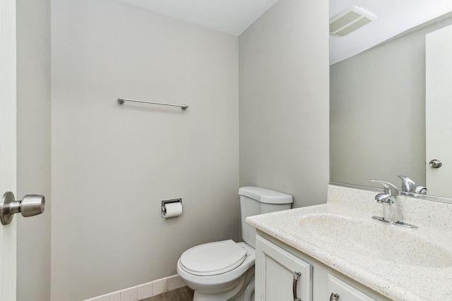 254 E Bailey Rd Unit M, Naperville, IL 60565 - bathroom with visible vents, toilet, and vanity