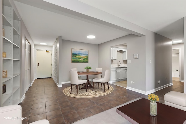 254 E Bailey Rd Unit M, Naperville, IL 60565 - dining space with dark tile patterned floors and baseboards