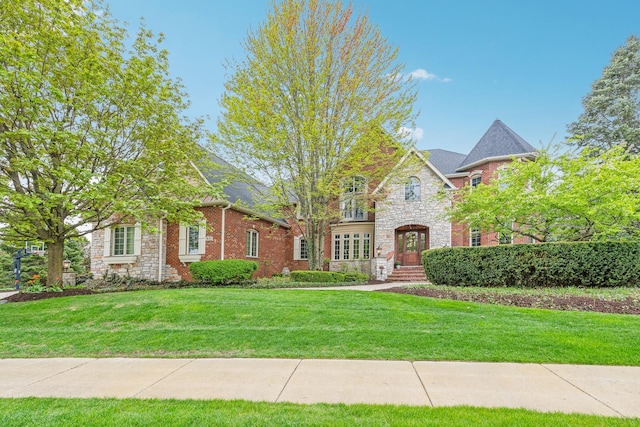 831 Alberosky Way, Batavia, IL 60510 - view of front of property featuring stone siding and a front lawn