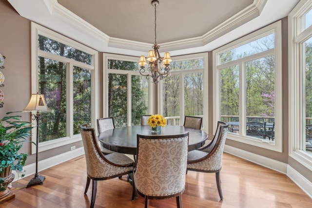 831 Alberosky Way, Batavia, IL 60510 - sunroom featuring crown molding, baseboards, a tray ceiling, a chandelier, and wood finished floors