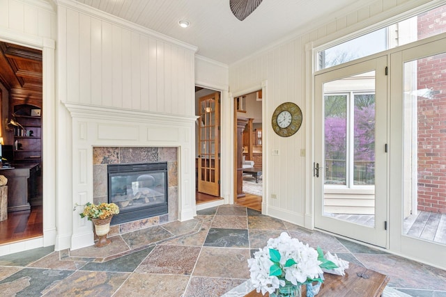 831 Alberosky Way, Batavia, IL 60510 - living area featuring stone tile flooring, ornamental molding, and a tile fireplace