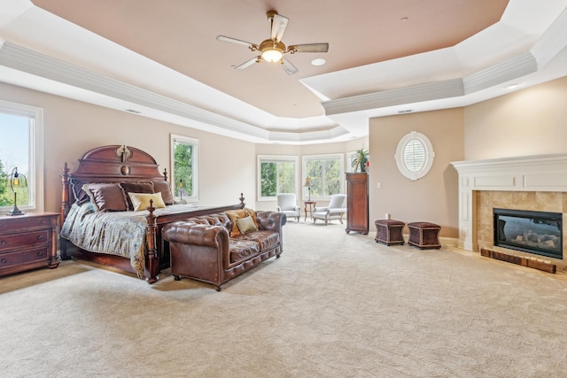 831 Alberosky Way, Batavia, IL 60510 - carpeted bedroom featuring a raised ceiling, crown molding, a fireplace, and a ceiling fan