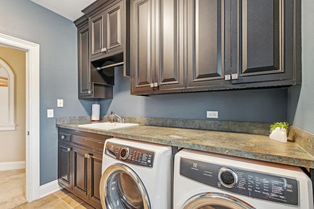 831 Alberosky Way, Batavia, IL 60510 - washroom featuring washing machine and clothes dryer, cabinet space, baseboards, and light tile patterned flooring