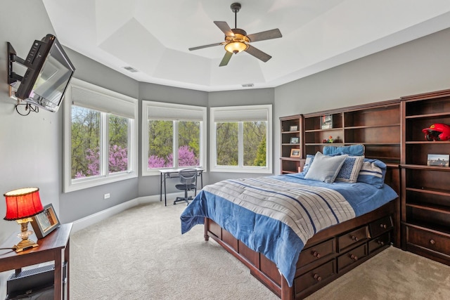 831 Alberosky Way, Batavia, IL 60510 - bedroom featuring carpet floors, a tray ceiling, baseboards, and ceiling fan