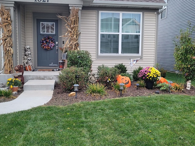1027 Blazing Star St, South Elgin, IL 60177 - doorway to property featuring a lawn