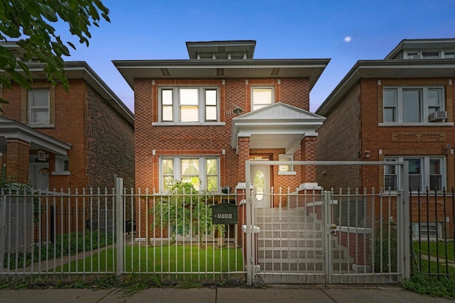 4944 S Honore St, Chicago, IL 60609 - american foursquare style home with a gate, a fenced front yard, and brick siding