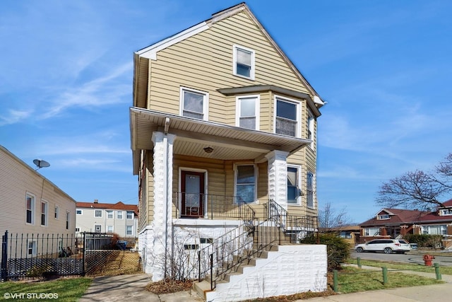 4734 W Palmer St, Chicago, IL 60639 - view of front of house with covered porch and fence