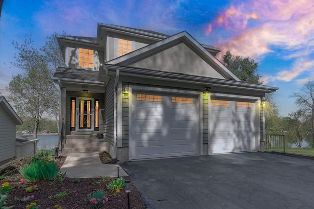 934 Robertson Rd, South Elgin, IL 60177 - view of front of property featuring driveway and a garage