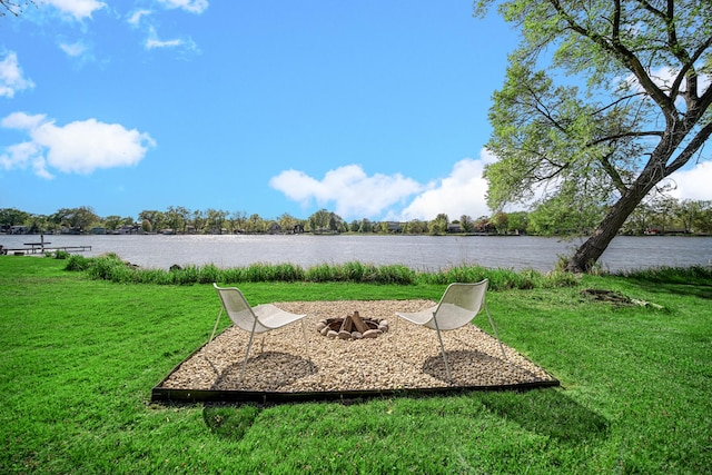 934 Robertson Rd, South Elgin, IL 60177 - view of green lawn featuring a water view and a fire pit