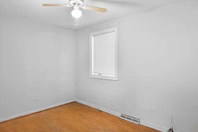 5817 W 16th St, Cicero, IL 60804 - spare room with baseboards, ceiling fan, visible vents, and light wood-style floors