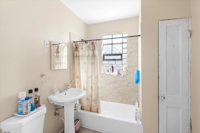 5817 W 16th St, Cicero, IL 60804 - full bathroom featuring toilet, shower / bath combo, and a sink