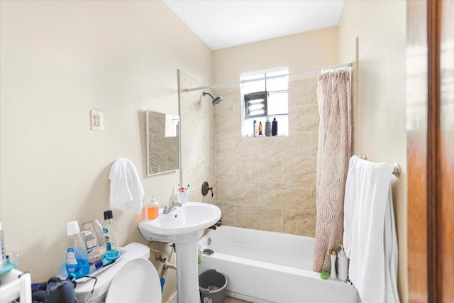 5817 W 16th St, Cicero, IL 60804 - bathroom with a sink and shower / bathtub combination with curtain