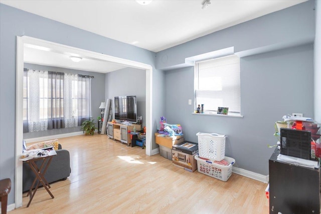 5817 W 16th St, Cicero, IL 60804 - playroom with baseboards and wood finished floors