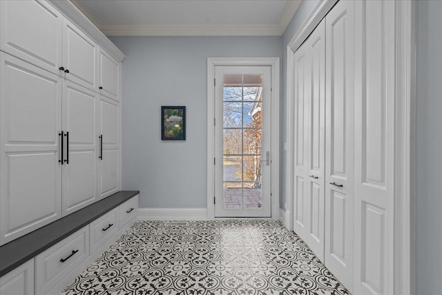 mudroom featuring baseboards and ornamental molding