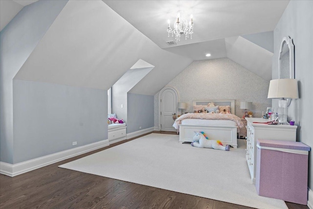 bedroom with visible vents, baseboards, wood finished floors, lofted ceiling, and an inviting chandelier