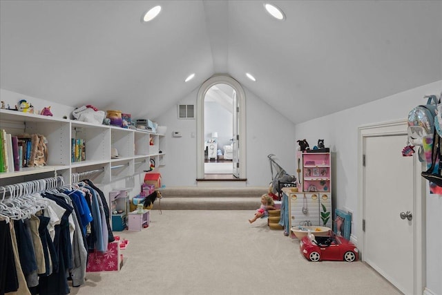 recreation room with lofted ceiling, visible vents, recessed lighting, and carpet