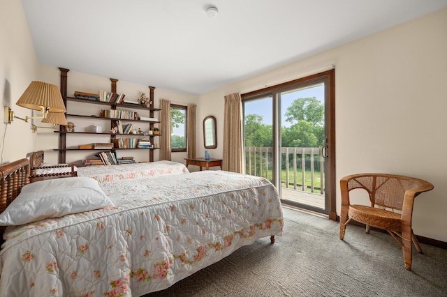 bedroom featuring carpet and access to outside