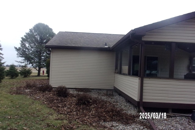 507 N Fifth St, Ashkum, IL 60911 - view of side of home with a sunroom and a shingled roof