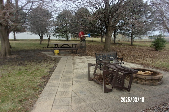 507 N Fifth St, Ashkum, IL 60911 - view of patio / terrace featuring an outdoor fire pit