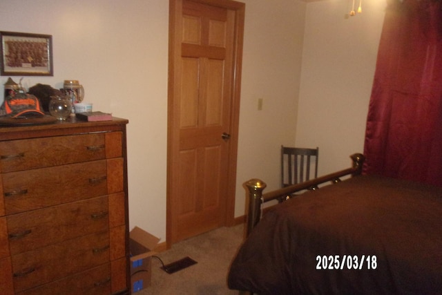 507 N Fifth St, Ashkum, IL 60911 - bedroom featuring visible vents and carpet