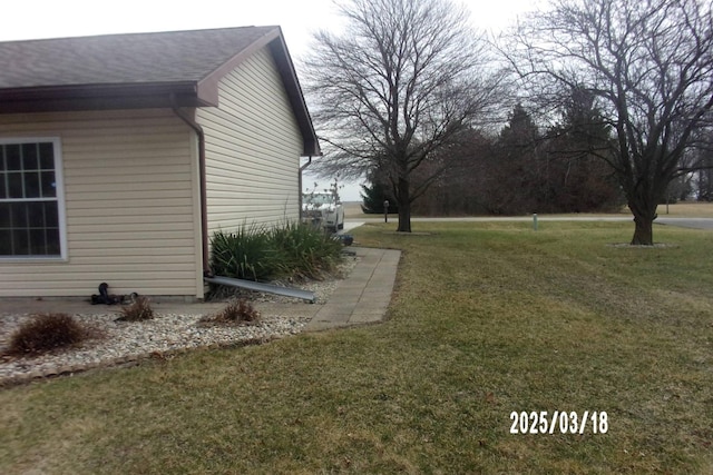 507 N Fifth St, Ashkum, IL 60911 - view of side of home with a lawn