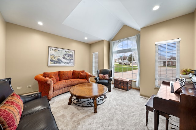 living area with recessed lighting, baseboards, and lofted ceiling