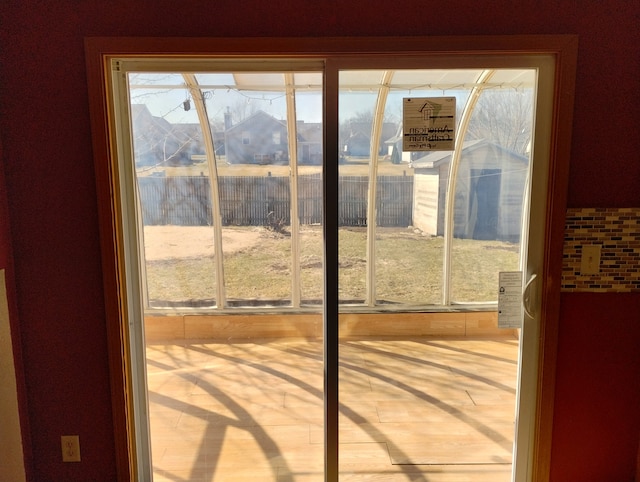 doorway to outside with a healthy amount of sunlight