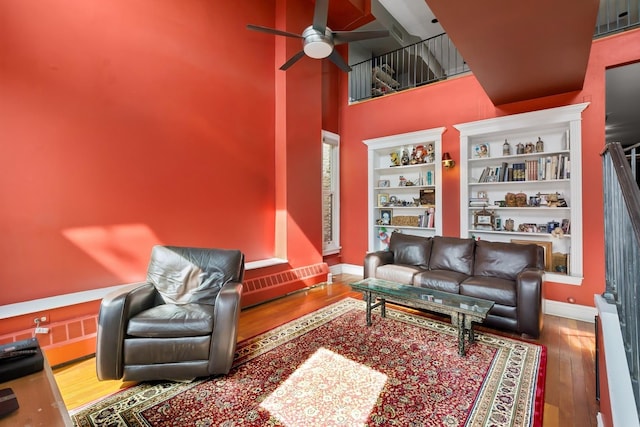 1957 W Schiller St, Chicago, IL 60622 - living area with ceiling fan, wood finished floors, and a towering ceiling