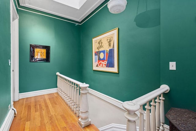 1957 W Schiller St, Chicago, IL 60622 - hall with an upstairs landing, a baseboard radiator, wood finished floors, crown molding, and a skylight