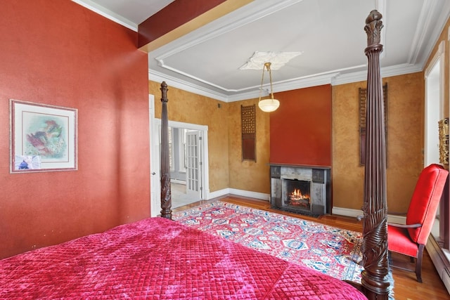 1957 W Schiller St, Chicago, IL 60622 - bedroom featuring wood finished floors, ornamental molding, and a fireplace