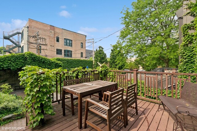 1957 W Schiller St, Chicago, IL 60622 - wooden terrace featuring outdoor dining space