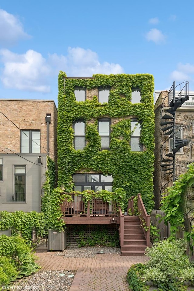 1957 W Schiller St, Chicago, IL 60622 - back of house featuring stairs and a deck
