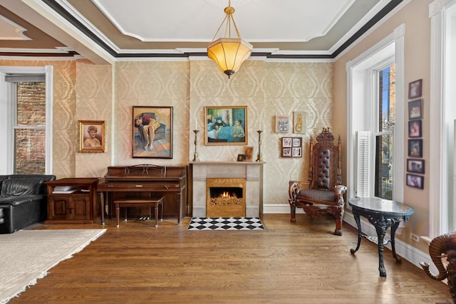 1957 W Schiller St, Chicago, IL 60622 - sitting room featuring wallpapered walls, wood finished floors, healthy amount of natural light, crown molding, and a fireplace with flush hearth