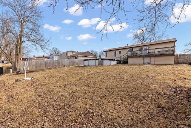 580 Whitehall Way, Bolingbrook, IL 60440 - view of yard with a fenced backyard, a deck, and a fenced in pool
