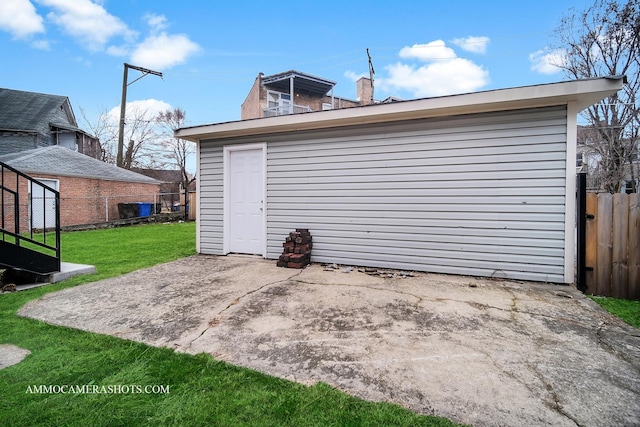 garage with fence