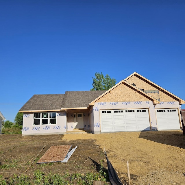 5078 Keri Dr, Loves Park, IL 61111 - property in mid-construction with driveway, a garage, and roof with shingles