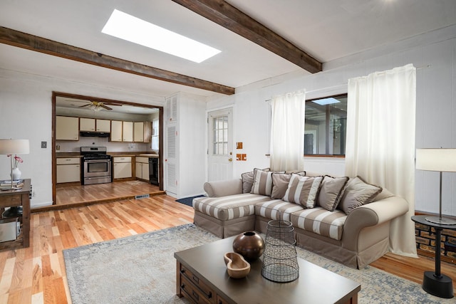 2201 W Acres Rd, Joliet, IL 60435 - living room with light wood finished floors, beam ceiling, baseboards, and ceiling fan