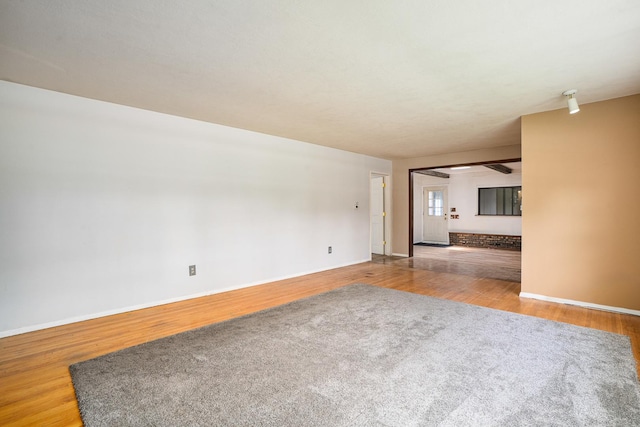 2201 W Acres Rd, Joliet, IL 60435 - spare room with wood finished floors and baseboards