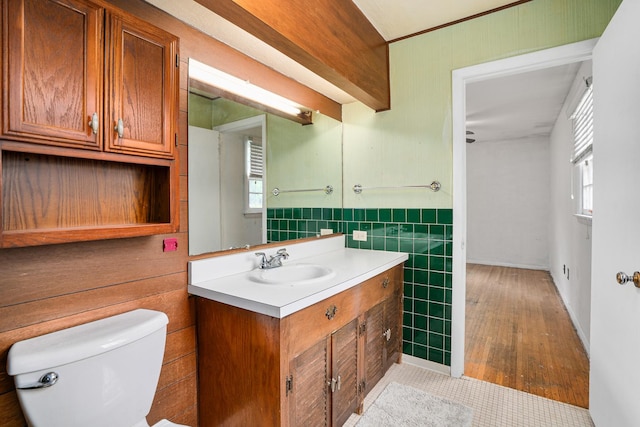 2201 W Acres Rd, Joliet, IL 60435 - bathroom featuring vanity, tile walls, toilet, plenty of natural light, and tile patterned flooring