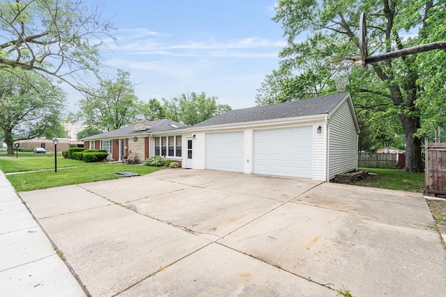 2201 W Acres Rd, Joliet, IL 60435 - ranch-style home with an attached garage, driveway, and roof with shingles