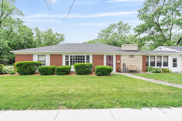 2201 W Acres Rd, Joliet, IL 60435 - ranch-style house featuring a chimney, a front yard, brick siding, and roof with shingles