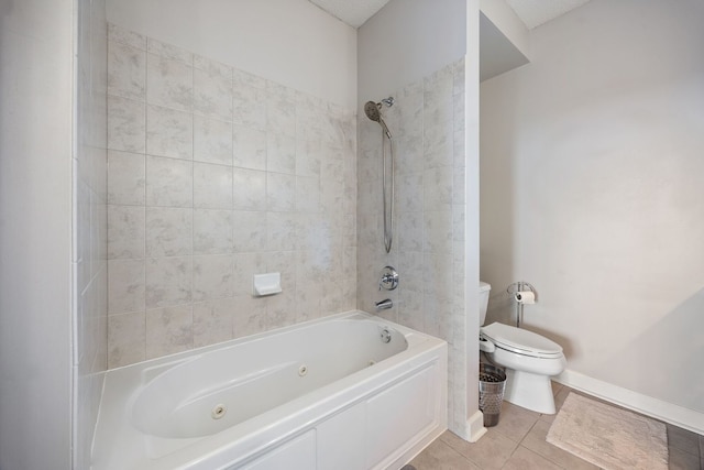 full bath with baseboards, toilet, a combined bath / shower with jetted tub, and tile patterned flooring
