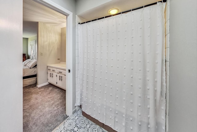 868 Bonnie Brae Ln, Bolingbrook, IL 60440 - ensuite bathroom featuring curtained shower and ensuite bathroom